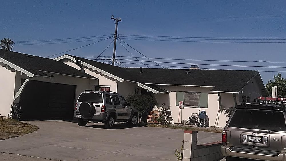 Slide of Espino Roofing