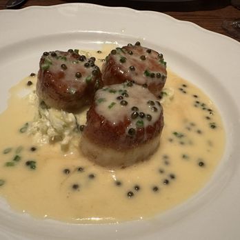 Little Sparrow - Seared Scallops with melted cabbage and a creamy caviar sauce. - French Near Me - Atlanta, Georgia Little Sparrow - Seared Scallops with melted cabbage and a creamy caviar sauce. - French Near Me - Atlanta, Georgia