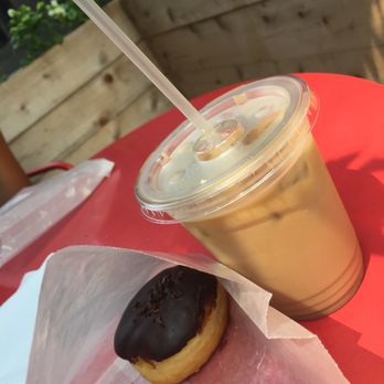 Firecakes Donuts - Valrhona Chocolate & Espresso Cream and a small iced coffee - Bakeries Near Me - Chicago, Illinois
