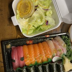 E Sushi Japanese Restaurant - Sashimi (all raw salmon, tuna, yellowtail), and side salad