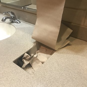Buffalo Wild Wings - Restroom upon opening hours. Trash is so full and clean paper towel keeps releasing into overflowing trash - American Near Me - Memphis, Tennessee