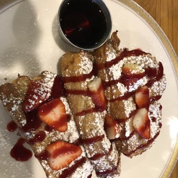 The Refectory Cafe - Challah French Toast with raspberry drizzle, powdered sugar, fresh strawberries, and maple syrup. - New American Near Me - Durham, North Carolina The Refectory Cafe - Challah French Toast with raspberry drizzle, powdered sugar, fresh strawberries, and maple syrup. - New American Near Me - Durham, North Carolina