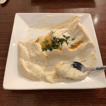 El Turco Grill - Half eaten Hummus - Mediterranean Near Me - Hackensack, New Jersey