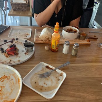 Cafe Wild - Couldn't wait to dig in. I had the Cali girl omelette, my friend had the beach burrito and we ordered a side of cinnamon roll French toast. - Breakfast & Brunch Near Me - Manhattan Beach, California