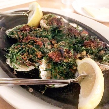 Tempest Oyster Bar - Rockefeller oyster. Good texture and well balanced flavor. The oyster flavor stood out even with the herbs and scallop - Bars Near Me - Madison, Wisconsin