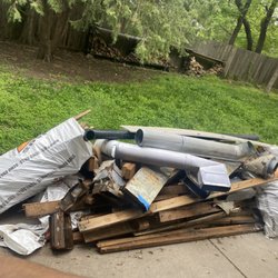 Junksternaut Junk Removal - Pile of junk from homeowners driveway cleared out!