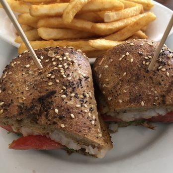 Balans - Blackened grouper sandwich with fries - New American Near Me - Miami Beach, Florida Balans - Blackened grouper sandwich with fries - New American Near Me - Miami Beach, Florida