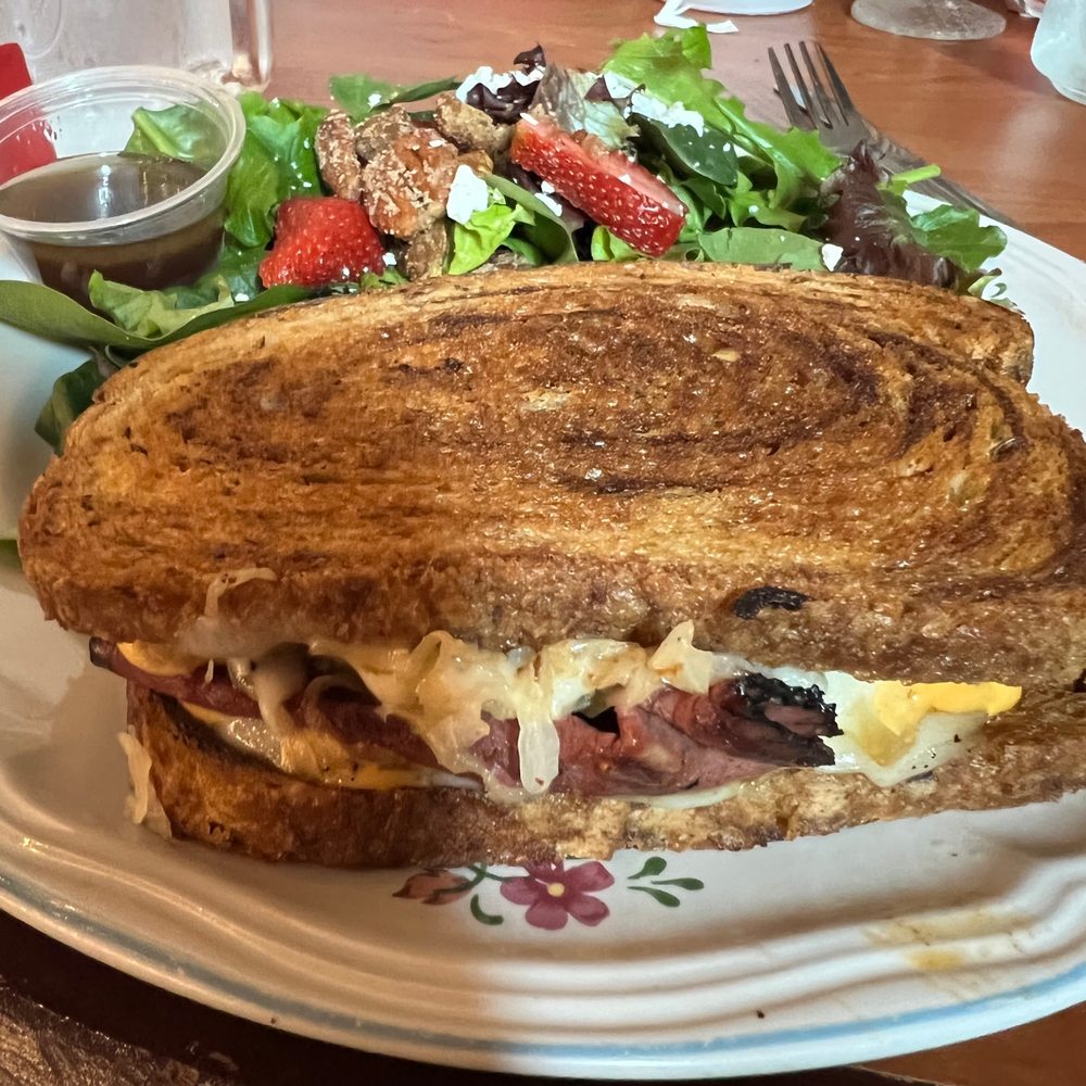 Reuben Sandwich with house salad with strawberries so awesome! Reuben Sandwich with house salad with strawberries so awesome!