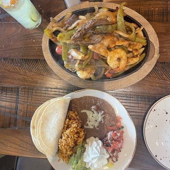 Soluna Cocina + Tequila Bar - Fiesta Fajita with chicken, steak, and shrimp (7.11.24) - Mexican Near Me - Elkridge, Maryland Soluna Cocina + Tequila Bar - Fiesta Fajita with chicken, steak, and shrimp (7.11.24) - Mexican Near Me - Elkridge, Maryland