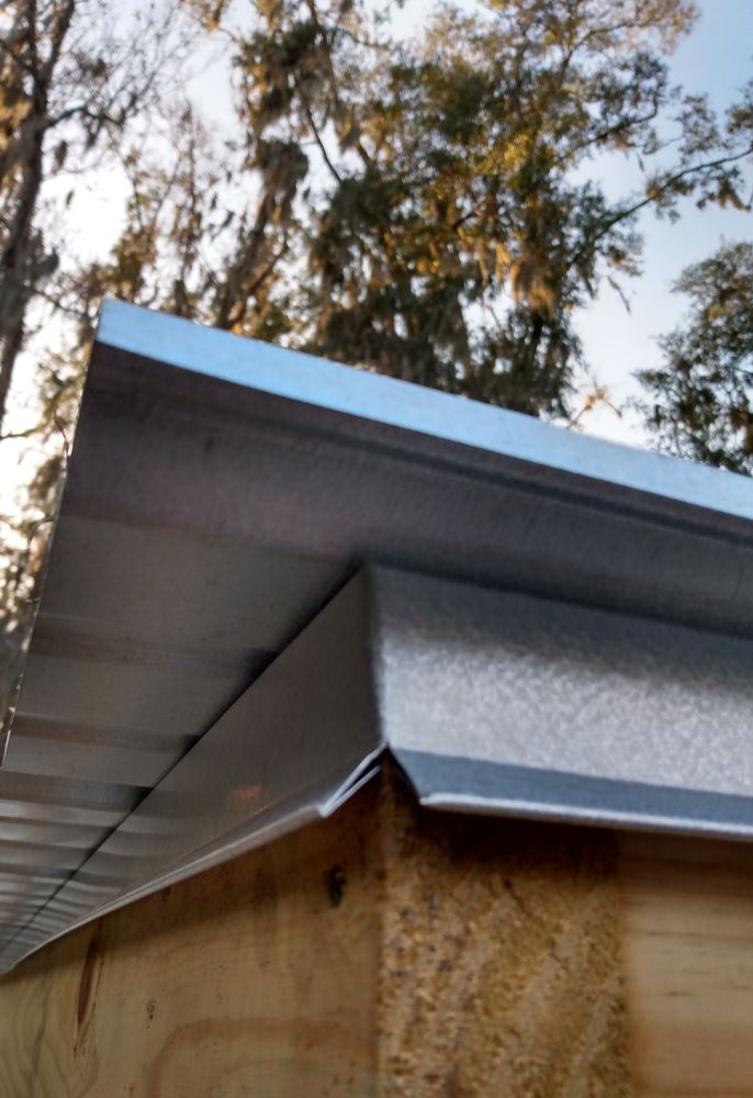 Slide of UnZucky Roofing