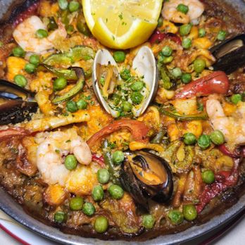 Alcala Restaurant - Paella with squid, shrimp, prawn, clams, monkfish and mussels - Spanish Near Me - New York, New York