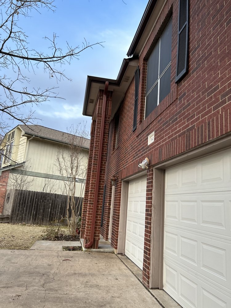 Slide of Gonzalez Seamless Rain Gutters