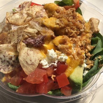 ImPerfect Fresh Eats - A small bowl with spinach and unlimited toppings paired with the ginger carrot sauce! Yum - Salad Near Me - Toronto, Ontario