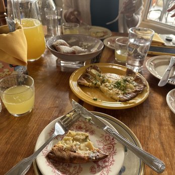Milktooth - Savory Dutch baby, mimosas, and beignets - Breakfast & Brunch Near Me - Indianapolis, Indiana Milktooth - Savory Dutch baby, mimosas, and beignets - Breakfast & Brunch Near Me - Indianapolis, Indiana