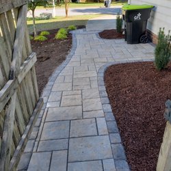 New path with yews installed by the waste bin pad