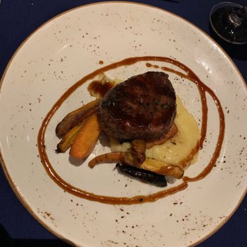 Narcoossee's - Filet Mignon over Mashed Potatoes - New American Near Me - Lake Buena Vista, Florida Narcoossee's - Filet Mignon over Mashed Potatoes - New American Near Me - Lake Buena Vista, Florida