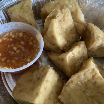 Thai House - Fried tofu appetizer. Tiny bit of sauce, we could have used 2 more little cups full. - Thai Near Me - Smithtown, New York