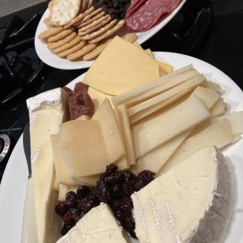Euphoric Cheese Shop - A mix of cheeses I bought from the shop: Griffen, double and triple cream Brie, Gouda, and some fancy Spanish cheese too. - Cheese Shops Near Me - Knoxville, Tennessee