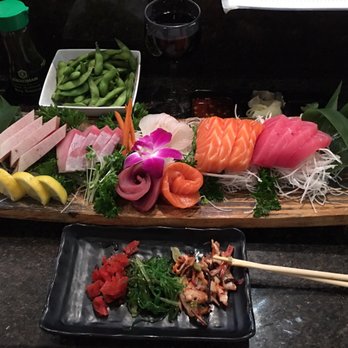 Omokase - 18 piece sashimi boat with edamame appittizer - Sushi Bars Near Me - Rancho Cucamonga, California Omokase - 18 piece sashimi boat with edamame appittizer - Sushi Bars Near Me - Rancho Cucamonga, California