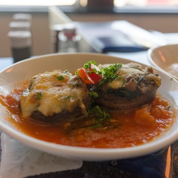 Emilio's Tapas - CHAMPINONES RELLENOS Mushroom cap filled with spinach, onions and fresh mozzarella, - Spanish Near Me - Hillside, Illinois Emilio's Tapas - CHAMPINONES RELLENOS Mushroom cap filled with spinach, onions and fresh mozzarella, - Spanish Near Me - Hillside, Illinois