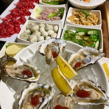 37 Xiang - Assorted hot pot dishes including oysters, snowflake beef, fish roe balls, quail eggs, mussels, and Japanese tofu - Hot Pot Near Me - Flushing, New York 37 Xiang - Assorted hot pot dishes including oysters, snowflake beef, fish roe balls, quail eggs, mussels, and Japanese tofu - Hot Pot Near Me - Flushing, New York