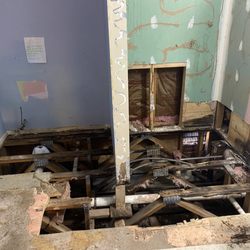 Michael's Plumbing & Heating - Toilet and shower only tore out. Left like this for A YEAR!