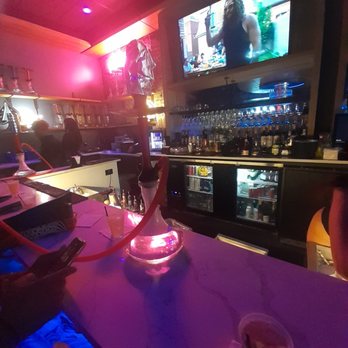 LIT Cigar & Martini Lounge - people sitting at the bar - Cocktail Bars Near Me - Tampa, Florida