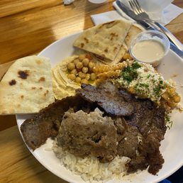 Gyro plate with 2 sides and a sauce. Big enough for two! Gyro plate with 2 sides and a sauce. Big enough for two!