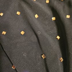 Dillard's - Various areas where the jewels popped off after one wear.