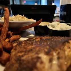 Triple J Steaks & Seafood - Blackened Grouper Dinner. It was really fast and good. I would definitely come here again.