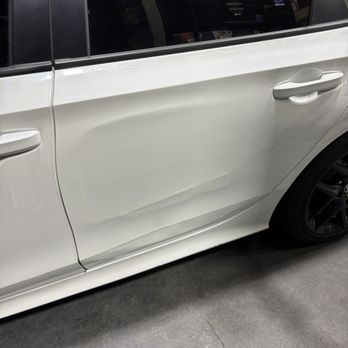 Supreme Smart Repairs - Before: Shallow dent (Top) and long crease dent along the body line (Bottom) - Mobile Dent Repair Near Me Supreme Smart Repairs - Before: Shallow dent (Top) and long crease dent along the body line (Bottom) - Mobile Dent Repair Near Me
