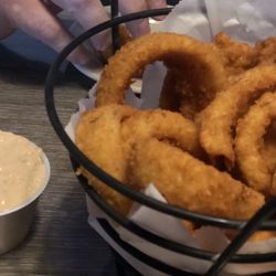 Kurtev's Backyard Grill and Bar - Onion rings with Cajun remoulade sauce.
