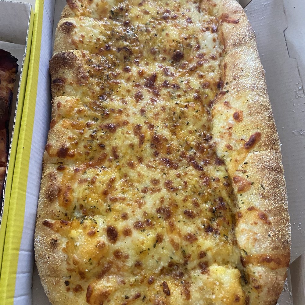 Hungry Howie's Pizza - 3 Cheeser Howie Bread - Pizza Near Me - Aurora, Colorado Hungry Howie's Pizza - 3 Cheeser Howie Bread - Pizza Near Me - Aurora, Colorado