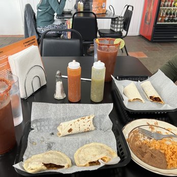 La Sierra - a table full of food and drinks - Mexican Near Me - Omaha, Nebraska