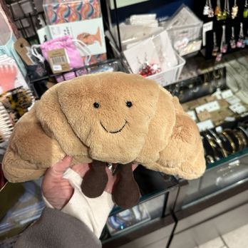 La Di Da Boutique - Jellycat croissant bag fits iPhone 14 Pro - Jewelry Near Me - Toronto, Ontario La Di Da Boutique - Jellycat croissant bag fits iPhone 14 Pro - Jewelry Near Me - Toronto, Ontario