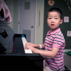 Boston Rainbow Bridge Learning Center - Music is an important part for children's learning.
