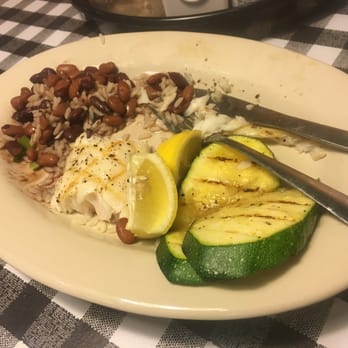 Flying Fish - This WAS almond crusted red snapper with grilled squash, red beans and rice. Sorry...it was too good to wait!!! - Seafood Near Me - Bentonville, Arkansas
