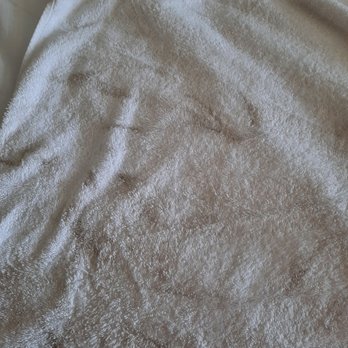 Hotel Tybee - Dirt from the floor on  white towel - Hotels Near Me - Tybee Island, Georgia