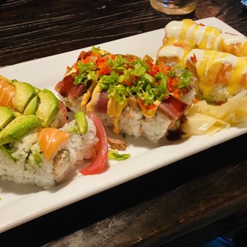 Minglewood Harborside - Left to right: Cali with rainbow sashimi on top, Tuna king, and salmon and mango. - Bars Near Me - Gloucester, Massachusetts