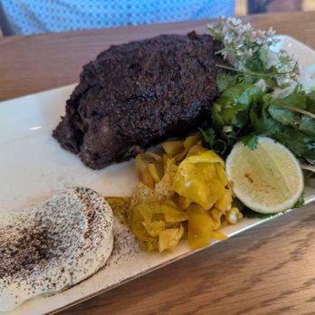 Leluia Hall - Jerk duck entree - Steakhouses Near Me - Charlotte, North Carolina