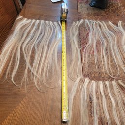 22 inch Bombshell hair extention that turned into 17 inch hair extentions after two months of wearing. 22 inch Bombshell hair extention that turned into 17 inch hair extentions after two months of wearing.