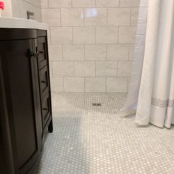 Zero barrier shower for a handicapped resident.