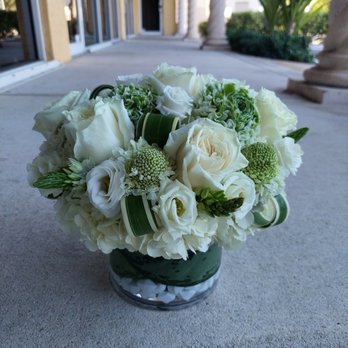 Tamara's Flower Garden - Tamara's Flowers made this gorgeous arrangement using exotic white flowers and green leaves.  Michael is truly an artist - Florists Near Me - Delray Beach, Florida