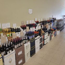 Woodland Hills Wine Company - Cheap but good wines line the wall of the rear (parking lot) entrance.