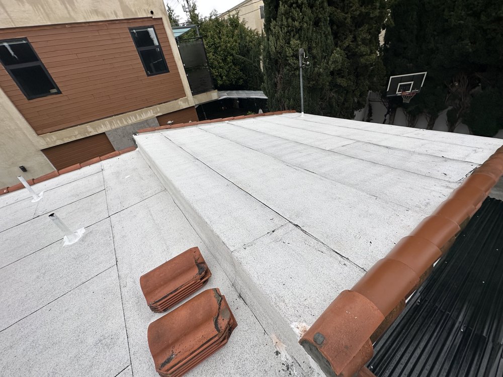 Slide of 3G Tres Generaciones Roofing