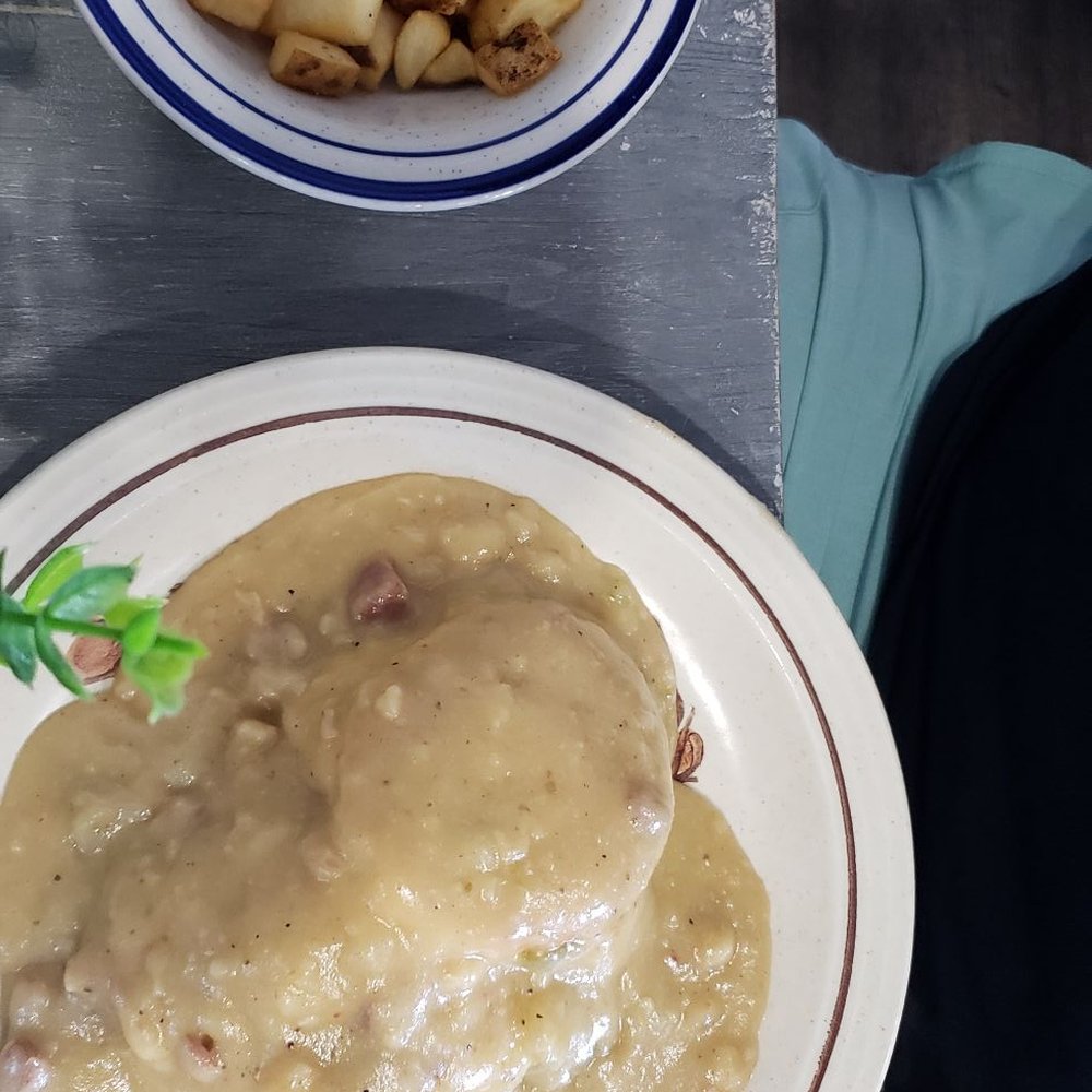 Millstone Biscuit - Bayou Buscuit with home fries on the side - Breakfast & Brunch Near Me - Murrells Inlet, South Carolina