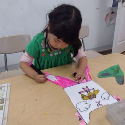 My daughter is designing a shirt.