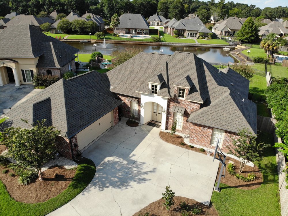 Slide of Mid City Roofing