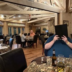 House of Embers - Brother hiding behind menu