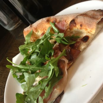 Siena Tavern - Roasted pear, prosciutto and arugala pizza with two cheeses, delicious and most filling for the price! - Italian Near Me - Chicago, Illinois